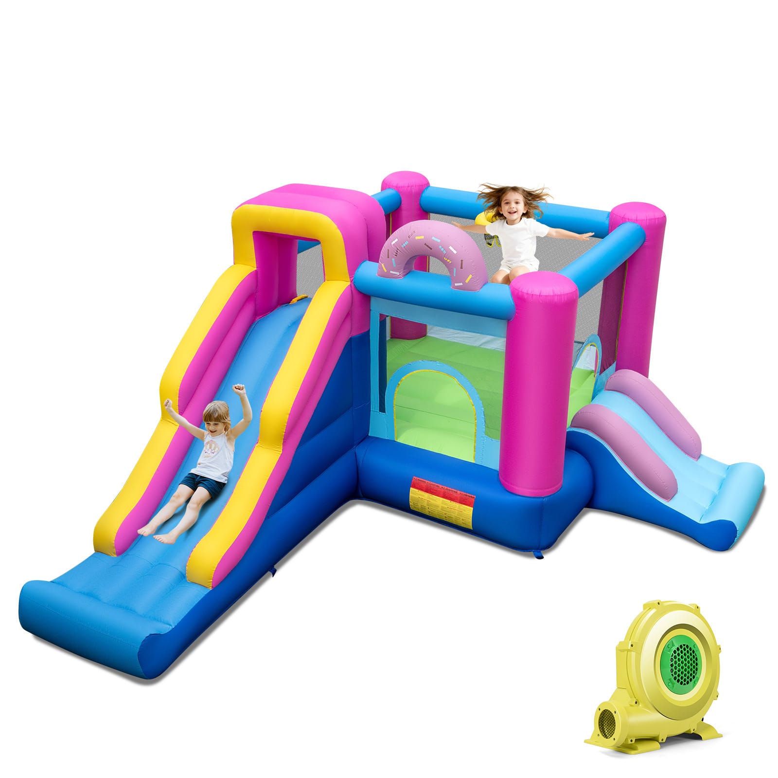 Doughnut inflatable bounce house set up in a backyard