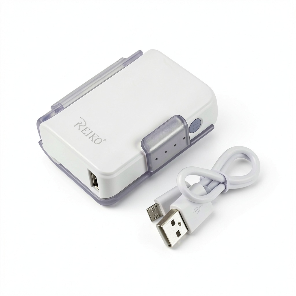 Installing Portable Power Bank 4000mAh External Battery Purple White on a wooden desk
