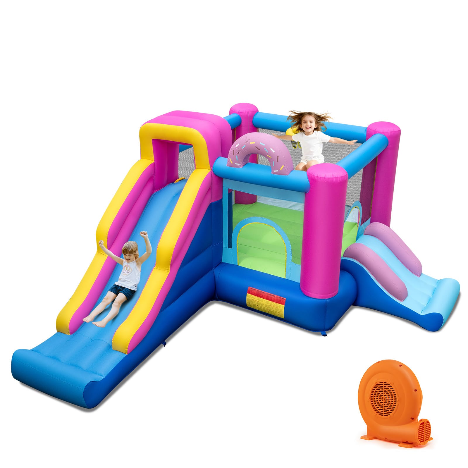 Doughnut inflatable bounce house set up in a backyard